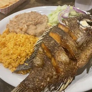 Whole fish with rice and beans
