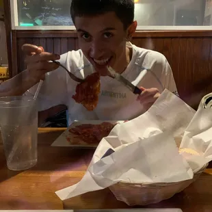 Mario Ramirez eating his chicken.