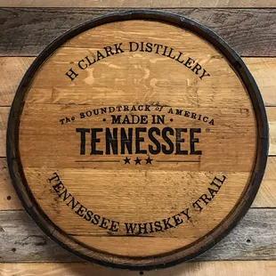 H.Clark. Distillery barrel top with the Tennessee Whiskey Trail logo.