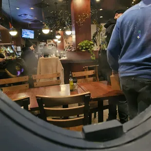 Waiting in vestibule, this large table (4 2 tops) sat empty 40+ min, while ppl stood waiting. Terrible seating system