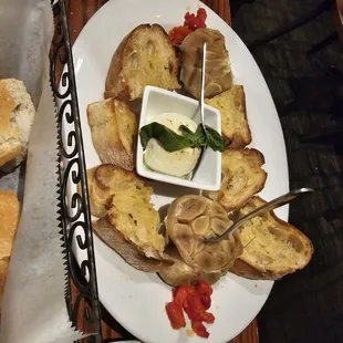 Roasted garlic bulbs, under-roasted garlic that wouldn't spread, goat cheese and a little roasted pepper with toast