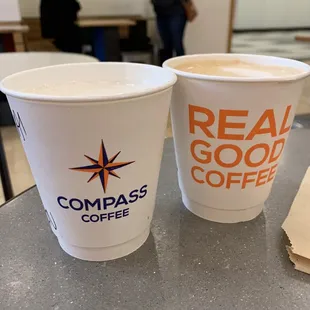 two cups of coffee on a table