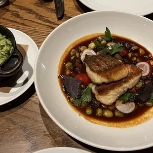 Fish of the day in Jamaican stew with cilantro and coconut rice