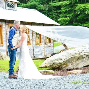 Carrie and Ron 2018 - 08-25 Memory Mountain after ceremony vale blowing