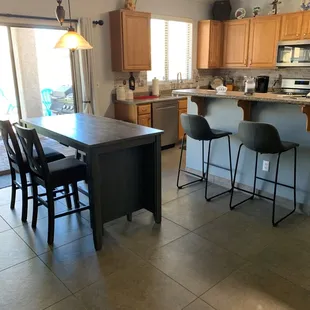 a kitchen and dining area