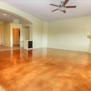 Previous flooring. Stained concrete was worn and peeling.