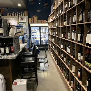 rows of wine bottles on shelves