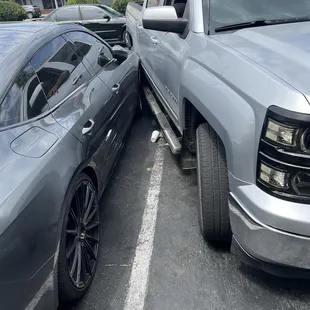 My car that got hit in their parking lot and the car that the prostitute got into (black Nissan)