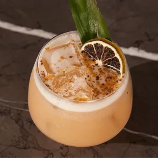 oaxaca colada 

tequila, stone fruit vodka, ginger + pineapple shrub, lime, coconut cream 

piña colada remix, balanced, bright acidity