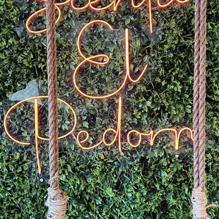 This signage in Spanish translation means a very vulgar and offensive way to tell you to sit your butt.