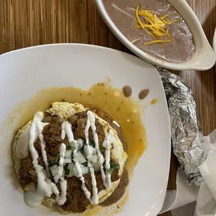 Huevos Rancheros with side of pinto refried beans