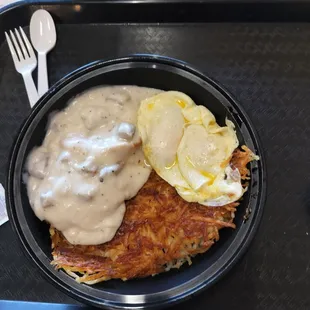 Biscuits and gravy w/2 over easy eggs.