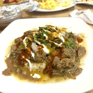 Huevos Rancheros with green pork sauce