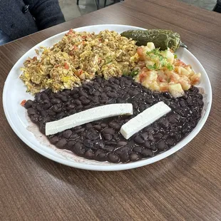 Machaca and eggs, served with beans