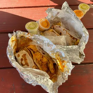 Left~Chorizo, egg and cheese Right~Bacon, egg and Cheese...orange sauce was unique and dang good!!