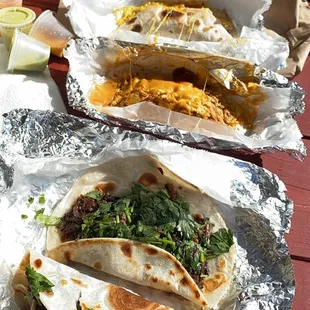 Breakfast Tacos - barbacoa with cilantro- chorizo egg and cheese - potatoe egg and cheese with flour tortillas