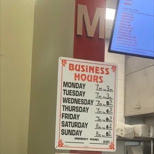a business hours sign