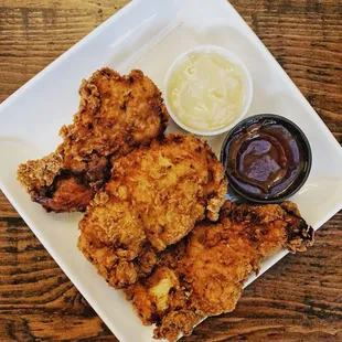 Chicken Tenders -- Fresh hand battered Chicken Tenders served with BBQ and Honey Mustard