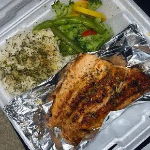 My meal salmon and seasoned rice with veggies