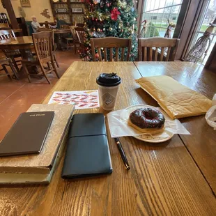 Donut. Coffee. Christmas tree. Dining area.