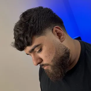 Mid Taper Textured top on wavy hair