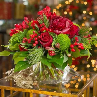 Christmas Bouquet of peonies, roses, alstroemerias, hypericum berries, dianthus, seasonal greens and holiday cheer! 
Merry Christmas!
