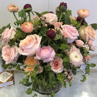 Ranunculous, Peonies, Berries and Roses.