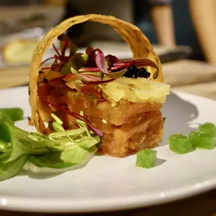 Heirloom Tomato Terrine with garlic tuile, mache lettuce cucumber gelee with a champagne vin froth