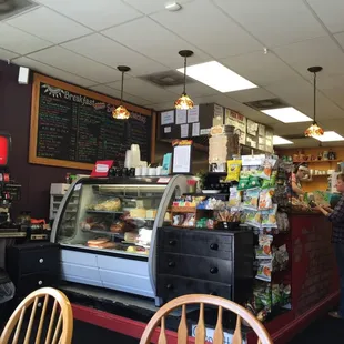 a woman standing at the counter