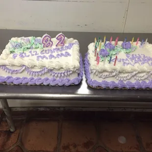 two birthday cakes on a table
