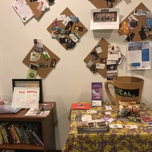 a table with a yellow tablecloth covered with a yellow tablecloth