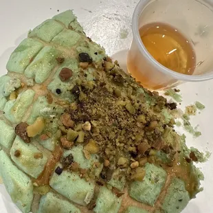 Pistachio concha with a side of honey