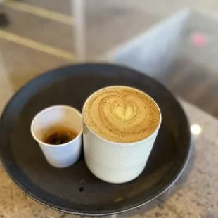 Saffron Oat Latte and an espresso