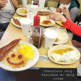 a group of people eating breakfast