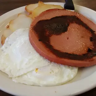 2 eggs over medium, taters and fried bologna