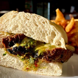 Tri tip melt with fontina and house-made chimichurri.
