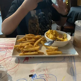 Our son enjoyed the kids Mac and cheese with crispy fries and a chocolate milk. They have paper on the tables and crayons to pass the time.