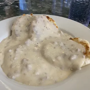 Biscuits and gravy with house gravy.  Delicious.