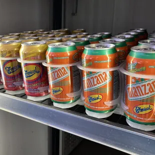a shelf of cans