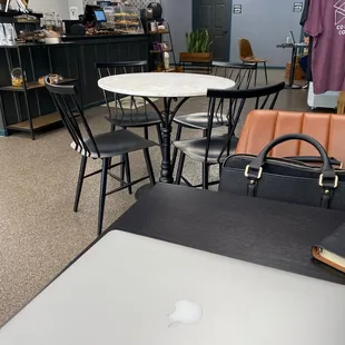 a table with a laptop on it