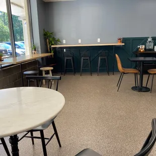 tables and chairs in a coffee shop