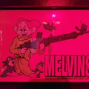 a cartoon character holding a machine gun