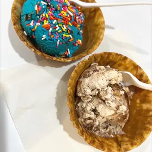 two cones with ice cream and sprinkles