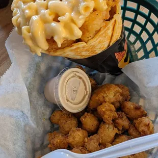 That is a waffle cone with fried shrimp at the base and mac and cheese on top and a side of fried cauliflower. I miss it already.