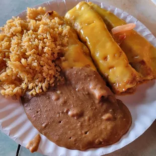 Chicken (onion) enchiladas with beans and rice