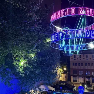 a neon sign for a restaurant