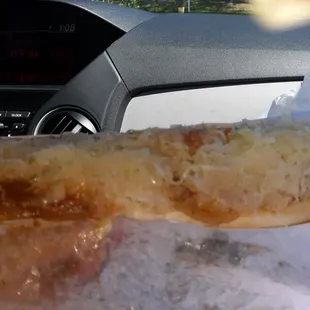 My footlong Coney dog with chopped onion, yellow mustard and sauerkraut piled high! Yum!!