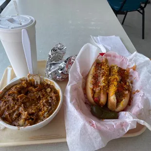 two hot dogs and a bowl of chili