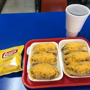 6 - Coneys - chili, cheese, kraut, mustard and a little Louisiana hot sauce!! 2 - Coneys - chili, cheese and onion!!