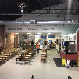 a restaurant with tables and chairs